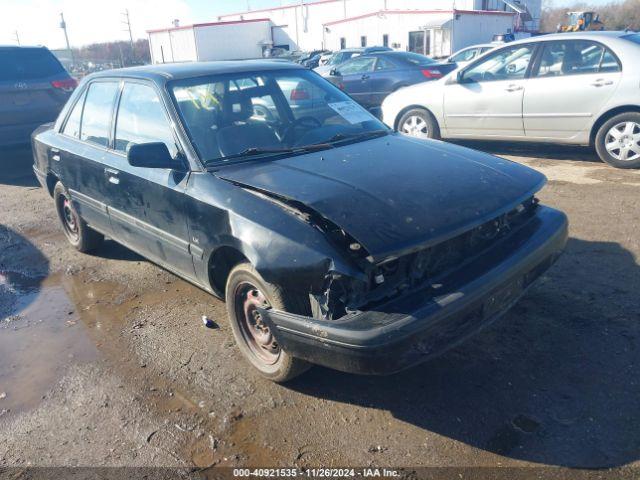  Salvage Mazda Protege