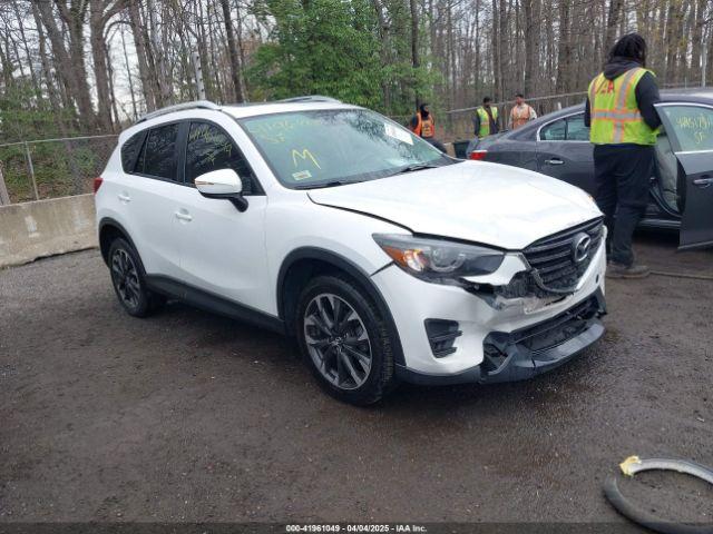  Salvage Mazda Cx
