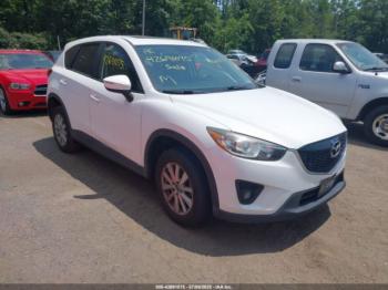  Salvage Mazda Cx
