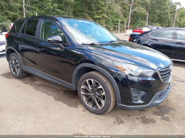  Salvage Mazda Cx